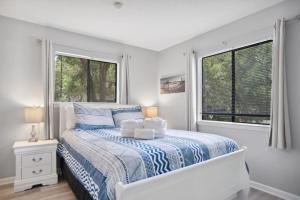 Ένα ή περισσότερα κρεβάτια σε δωμάτιο στο 5 stars Peaceful Condo - 7 min walk to the beach +18 φωτογραφίες