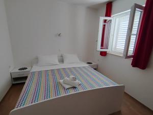 Ένα ή περισσότερα κρεβάτια σε δωμάτιο στο Villa Stanović Tea