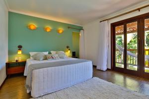 Cama ou camas em um quarto em Paraíso Ecológico Pousada & SPA