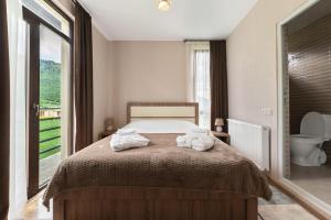 Letto o letti in una camera di Panorama Ushba