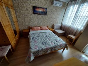 Postel nebo postele na pokoji v ubytování Апартамент Кънтри-Лариса
