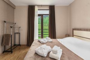 Letto o letti in una camera di Panorama Ushba