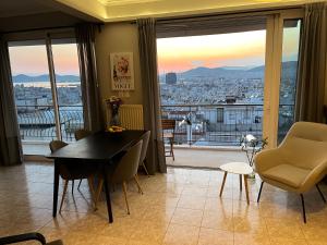 Posezení v ubytování Porto Pireo Penthouse Sea View