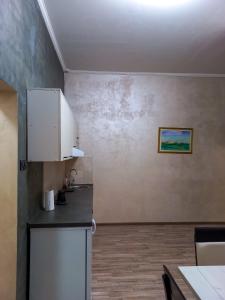 Kuchyň nebo kuchyňský kout v ubytování VOG Apartman