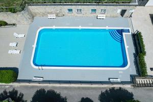 Bazén v ubytování Residence Altogarda nebo v jeho okolí