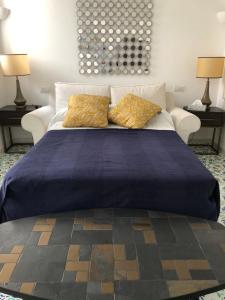 Postel nebo postele na pokoji v ubytování Villa Sain Charming Suite