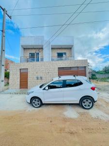 Imagine din galeria proprietății Sol Apartamento 4 - Quarto e sala com varanda e cozinha americana na praia do prea-CE în Prea