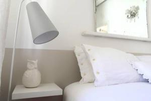 Letto o letti in una camera di Di punto in bianco home