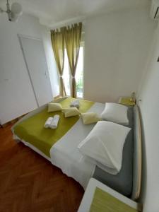 Postel nebo postele na pokoji v ubytování SOBE ŠOTIĆ