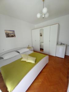 Postel nebo postele na pokoji v ubytování SOBE ŠOTIĆ