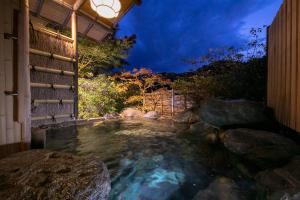 Bazén v ubytování Fukiya Ryokan nebo v jeho okolí