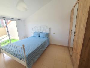 Posteľ alebo postele v izbe v ubytovaní Penthouse Blanes