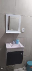 Vannas istaba naktsmītnē Casa Confortável