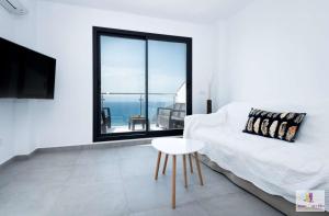 Posteľ alebo postele v izbe v ubytovaní Fenster zum Meer