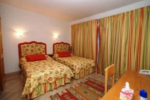 Letto o letti in una camera di Elba Luxury Villa