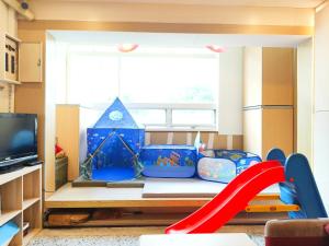 Uma televisão e/ou sistema de entretenimento em Yu Hsuan Homestay