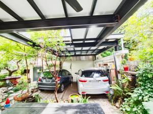 Um jardim no exterior de Yu Hsuan Homestay