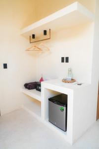 Kuchyň nebo kuchyňský kout v ubytování Tikul Hotel Boutique