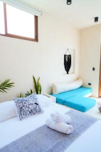 Postel nebo postele na pokoji v ubytování Tikul Hotel Boutique