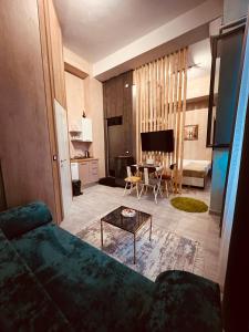 Posezení v ubytování Colombia Apartments&Rooms