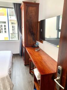 TV a/nebo společenská místnost v ubytování Luu Gia Hotel
