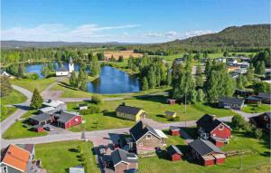 an aerial view of a small village with a lake at Cozy Home In Vuollerim With Wifi in Vuollerim