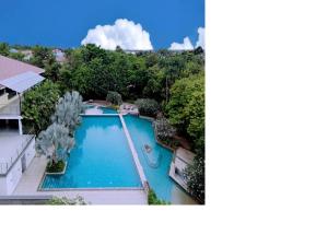 an aerial view of a swimming pool in a house at Nambiar Club Bellezea in Bangalore