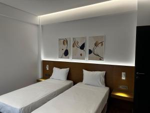 Letto o letti in una camera di Rustemi