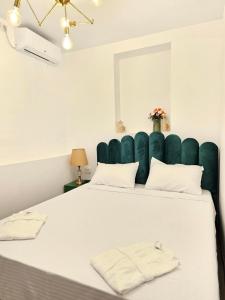 Postel nebo postele na pokoji v ubytování Boutique Hotel Honey