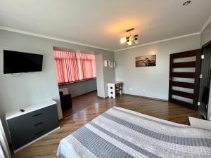 Postel nebo postele na pokoji v ubytování Apartment Halits'ka 133