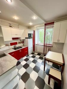Kuchyň nebo kuchyňský kout v ubytování Apartment Halits'ka 133
