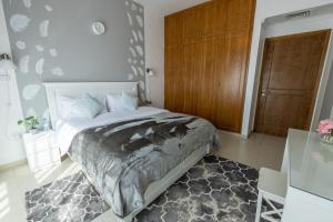 Ένα ή περισσότερα κρεβάτια σε δωμάτιο στο Super 2 Bedroom Sea Front (City View) +11 φωτογραφίες