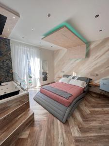 Postel nebo postele na pokoji v ubytování Suites Matteotti 57