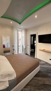 Postel nebo postele na pokoji v ubytování Suites Matteotti 57