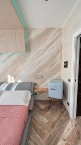 Postel nebo postele na pokoji v ubytování Suites Matteotti 57