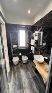 Koupelna v ubytování Suites Matteotti 57
