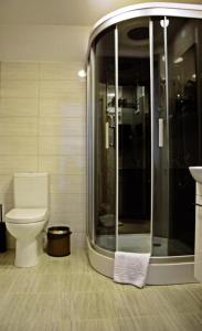 Ein Badezimmer in der Unterkunft Pasažo namai B&B