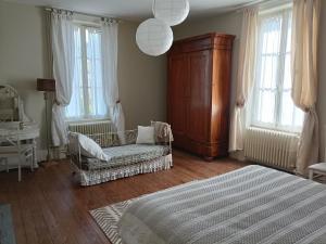 Posteľ alebo postele v izbe v ubytovaní Château d'Arfeuilles Chambres et tables d'hôtes