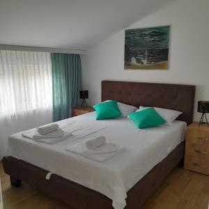 Postel nebo postele na pokoji v ubytování Spa Koncept-Apartmani + 37 fotografií