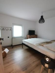 Postel nebo postele na pokoji v ubytování Apartma KORPEC