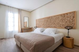 Postel nebo postele na pokoji v ubytování Ethereal Stay