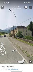 a screenshot of a street with a street light on the road at Le Chalet - Appartement 5 personnes avec parking in Savignac-les-Ormeaux