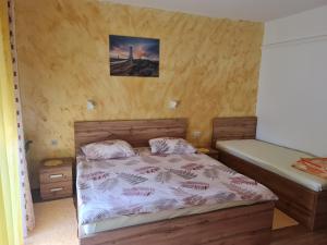 Postel nebo postele na pokoji v ubytování Villa Rab Robert