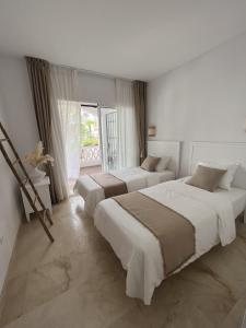 Posteľ alebo postele v izbe v ubytovaní Boutique apartment 365 - Marbella