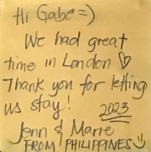 a letter with handwriting on a piece of paper at Gabe's Rooms in Central London in London