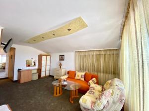 Posezení v ubytování Family Hotel The Golden fish