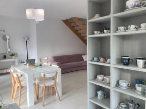 Posezení v ubytování B&B Sabbia e Sassi