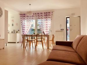 Posezení v ubytování B&B Sabbia e Sassi