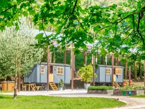 a group of tiny houses in a park at Annie - Uk44003 in Cold Kirby
