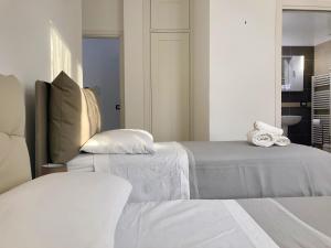 Postel nebo postele na pokoji v ubytování B&B Sabbia e Sassi